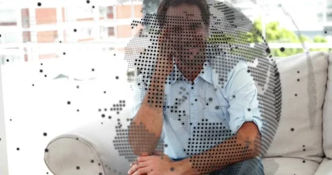 Tech pro adjusting eyeglasses engaging with rotating globe and code Stock Footage 318668998