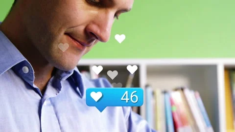 Tech pro raising arm glancing at wrist activating blue heart bubble counting Stock Footage 313774933