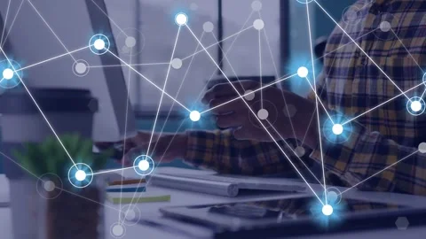 Tech pro tapping smartphone and activating growing network overlay while typing, Stock Footage 335235934