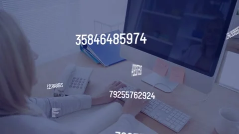 Tech pro typing at desk, clicking mouse initiating floating data moving across Stock Footage 335235982