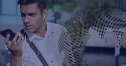 Tech pro walking waterfront pulling smartphone, speaking showing glitchy code Stock Footage 317459633