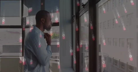 Tech professional adjusting collar at window initiating binary code cascading Stock Footage 311506440