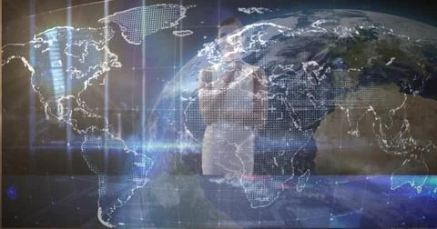 Tech professional analyzing world map display in control room, holographic Stock Photos