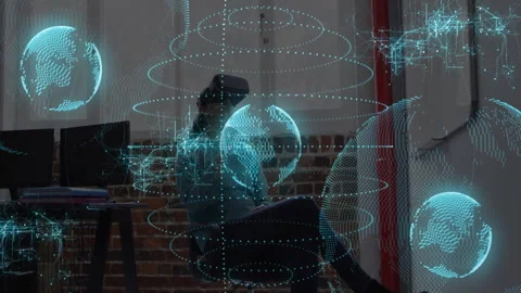 Tech professional donning VR headset and manipulating wireframe globe for data Video stock 311884197