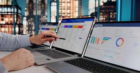 Tech Professional Reviewing CRM Analytics To Boost Sales And Marketing Perfor Stock Photos