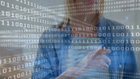 Tech professional tapping and swiping tablet causing binary overlay across face, Stock Footage 311585668