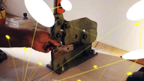 Tech pulling orange lever shearing part with snips white-yellow overlays hiding Stock Footage 332542948