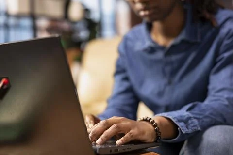 Tech savvy user working on a wireless laptop to test a new software Stock Photos