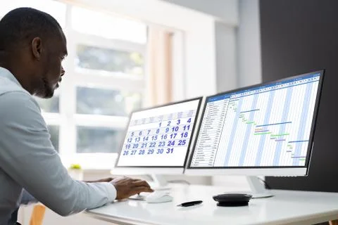 Tech Schedule List On Computer Screen Stock Photos