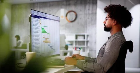Tech Schedule List On Computer Screen Stock Photos