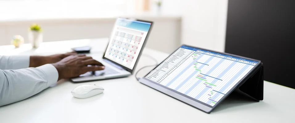 Tech Schedule List On Laptop Computer Screen Stock Photos