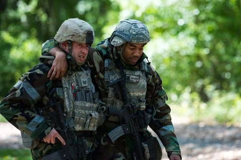 Tech. Sgt. Nathaniel Mace, 23rd Security Forces Squadron flight chief, lef... Stock Photos