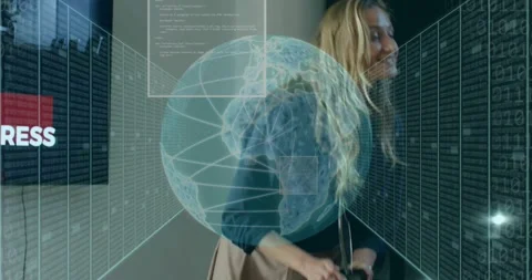 Tech specialist activating control device demonstrating 3D globe and data panels Stock Footage 318140832