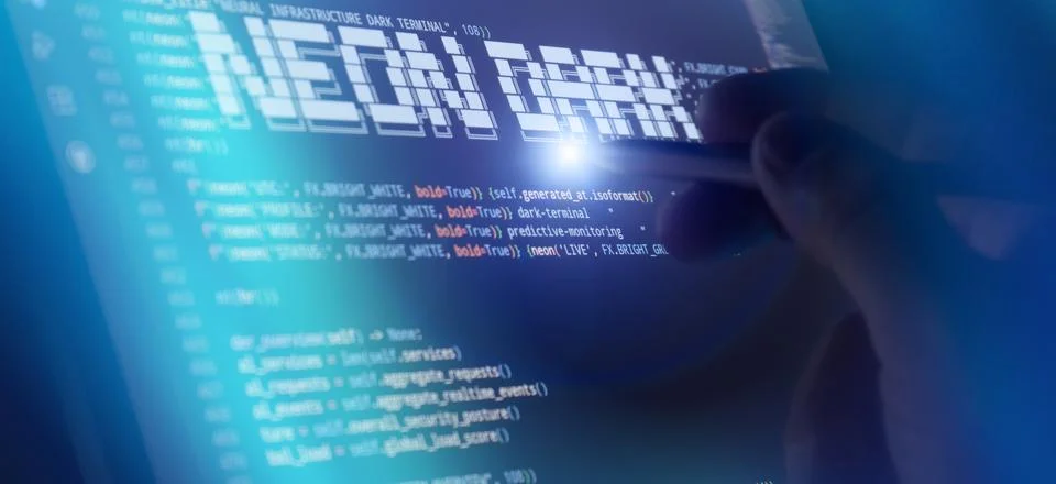 Tech specialist analyzing programming script on a futuristic digital interfac 스톡 사진