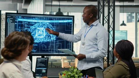 Tech startup office manager doing presentation on neural network technology Foto stock