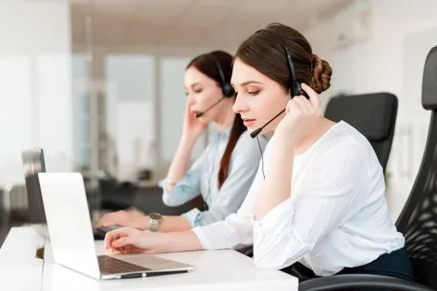 Tech support agent in a call center on a hotline. Business concept Stock Photos