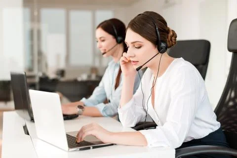 Tech support agent in a call center on a hotline. Business concept Stock Photos