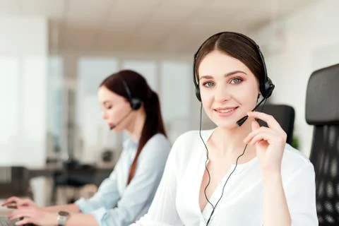 Tech support agent in a call center on a hotline. Business concept Stock Photos