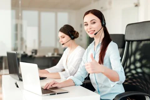 Tech support agent in a call center on a hotline. Business concept Stock Photos