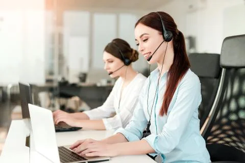 Tech support agent in a call center on a hotline. Business concept Stock Photos