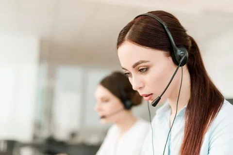 Tech support agent in a call center on a hotline. Business concept Stock Photos