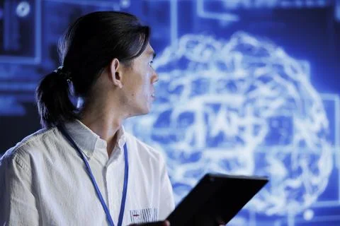 Tech support does AI systems checkup Stock Photos