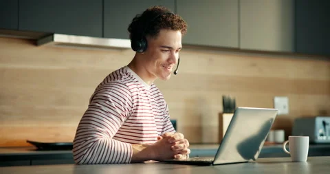 Tech support, laptop and man with headset, home or talking with contact or help Stock Footage 321324766