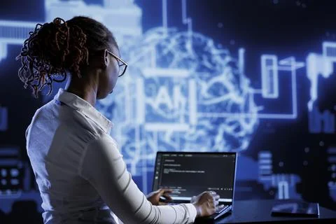 Tech support updating AI systems Foto stock
