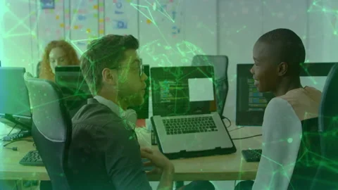 Tech team collaborating in open-plan office, displaying animated network overlay Stock Footage 308658490