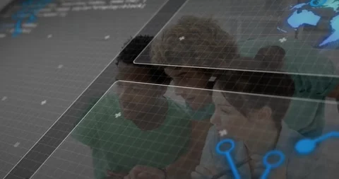 Tech team gathering around laptop as grid and globe icon shifting upward, Stock Footage 328529866