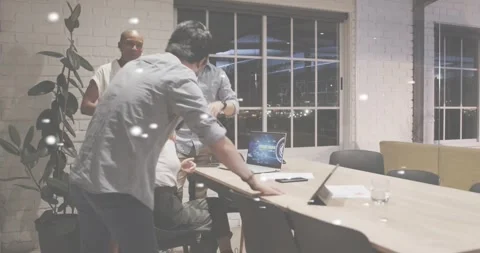 Tech team initiating data processing on laptop, analyzing and celebrating with Stock Footage 318179986