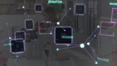 Tech team leaning over device and tapping, viewing animated SENSOR ACTUATE MOTOR Stock Footage 333169295