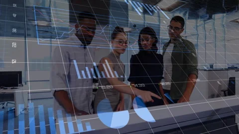 Tech team tapping swiping table causing holographic charts and graphs for Stock Footage 312842988