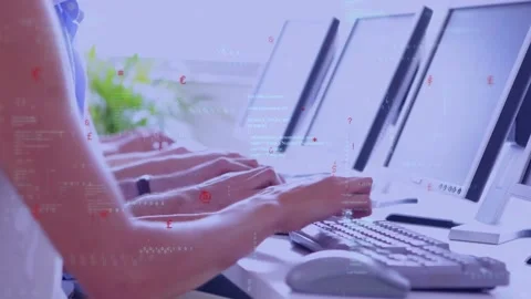 Tech team typing and clicking mice at long desk, handling alerts with overlays Stock Footage 334114428