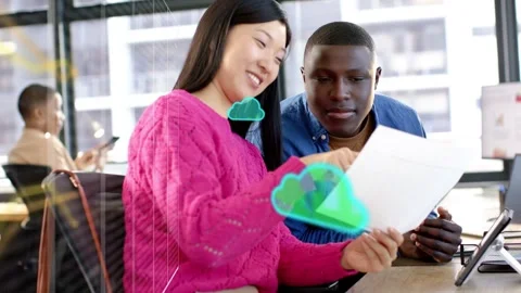 Tech two checking woman turning paper man leaning on tablet clouds growing over Stock Footage 334694081