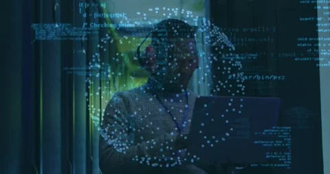 Tech typing laptop in data center starting code overlay rotating sphere over Stock Footage 331272812