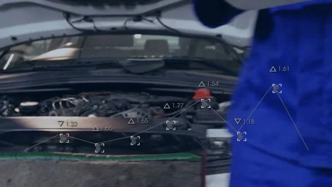 Tech typing on PC, inspecting engine and noting faults with animated overlay Video stock 332404927