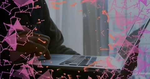 Tech user typing on laptop keys generating pink particles shifting orange on Stock Footage 318544573