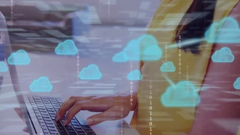 Tech woman typing laptop, generating cloud icons and binary streams for sync as Stock Footage 334883862