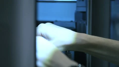 Tech worker accesses server hardware Stock Footage 344646132