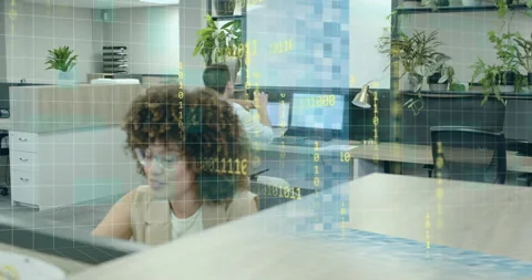 Tech worker glancing wristwatch and initiating scan with binary code swirling Stock Footage 314869108