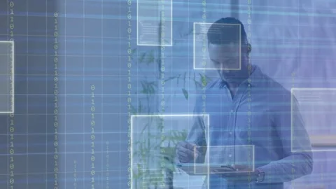 Tech worker tapping tablet with stylus, activating grid and floating UI panels Stock Footage 334694276
