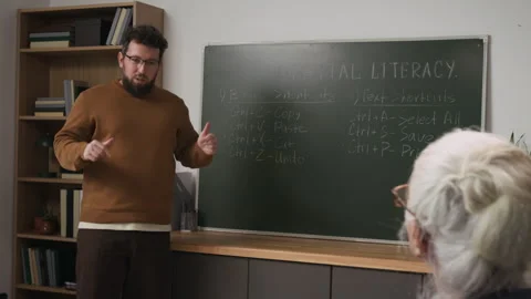 Techer Explaining Digital Literacy for Seniors Stock Footage 333710291