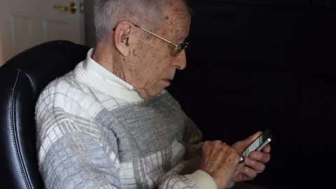 Techie Older man typing email on smart phone Stock Footage 165139273