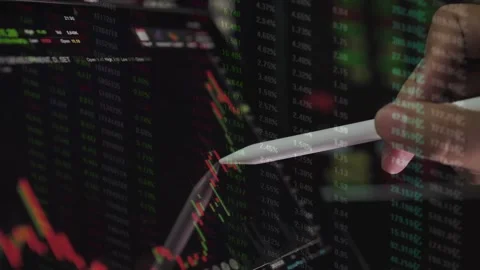 Technical Analysis with Stylus on Stock Trading Monitor Stock Footage 336478476