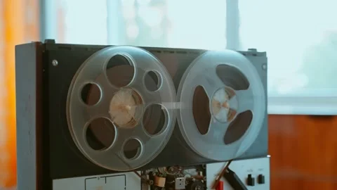 Technical breakdown and accumulation of tape winding in an old tape recorder Stock Footage 204131571