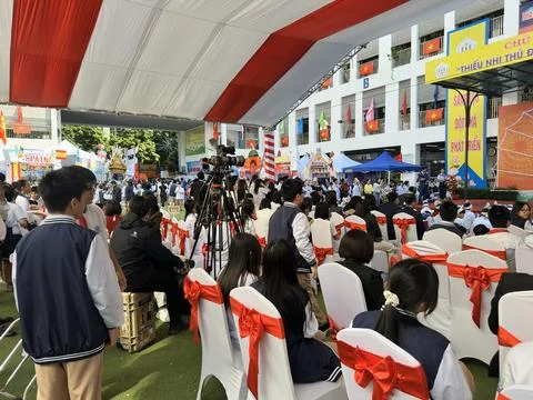 Technical camera crew filming the professional festival event at the schoolya Stock Photos