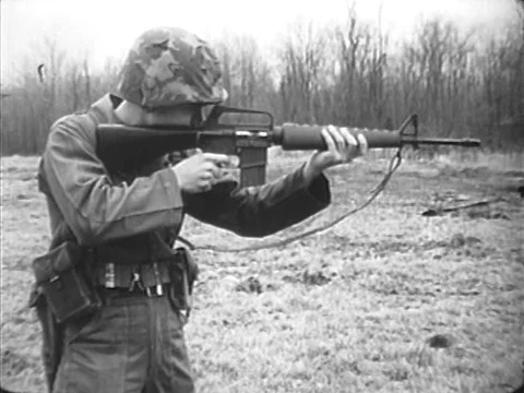 Technical characteristics of the M16 rifle is detailed in an instructional film Stock Footage 75201170