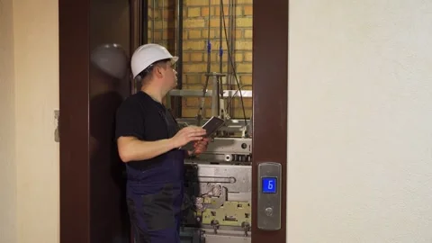 Technical check, adjustment of the elevator in the shaft before launch after Stock Footage 265258315