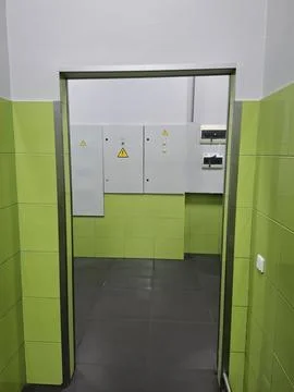 Technical corridor for personnel and the electrical control unit in supermark Fotos de archivo